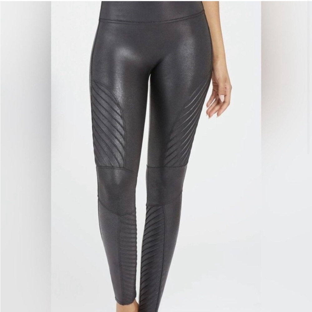 SPANX black faux leather leggings with stripe detail.